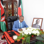 Italian ambassador signs the condolence book this morning at the Kenya Embassy based in Somalia.